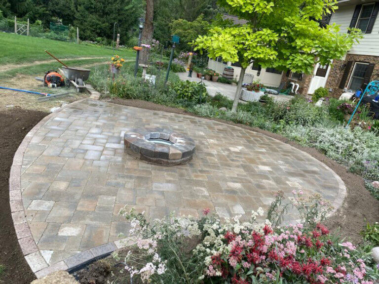 Freshly paved patio with new fireplace